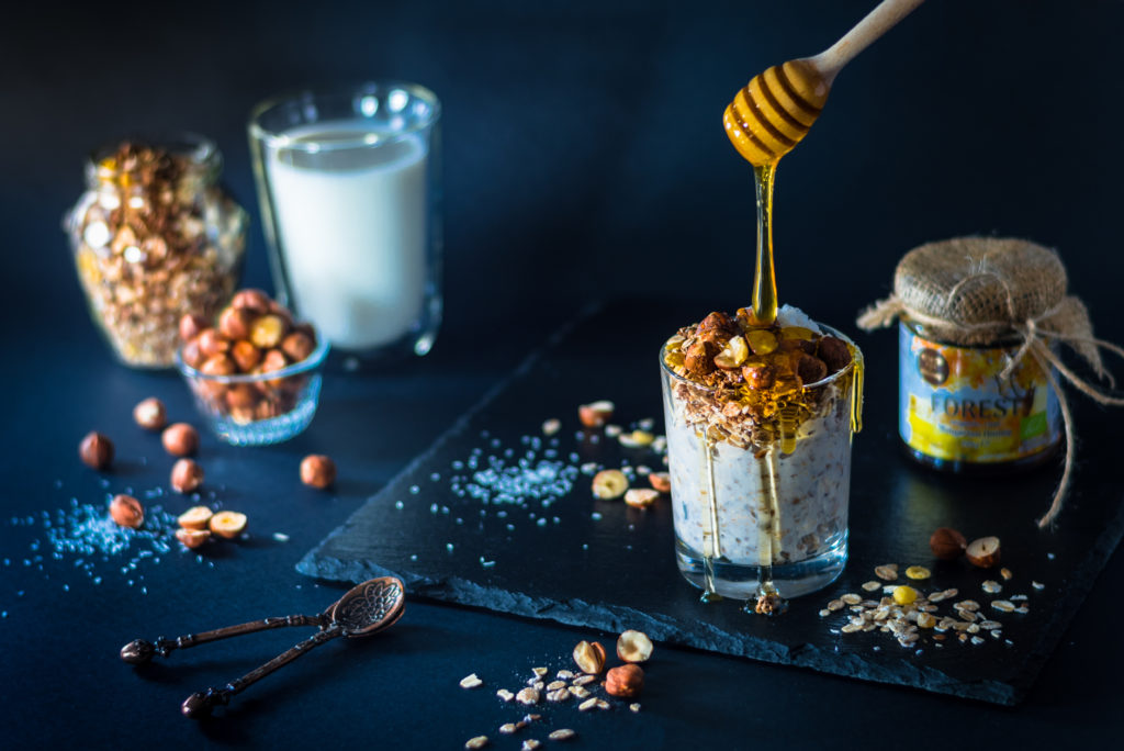 Honey jar and healthy breakfast